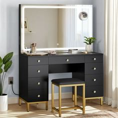 Treat yourself to a luxurious Large Mirror Vanity Desk with an LED-lit mirror that adjusts to three different light colors for perfect visibility. The vanity's tempered glass top offers plenty of space, blending style with practicality. It has nine drawers, including a central one with dividers, for easy access to your makeup and tools. Complete with a leather-look cushion stool, this set is both durable and easy to maintain, making your makeup application a luxurious and convenient experience. Bedroom For Women, Modern Vanity Desk, Vanity In Bedroom, Cushion Stool, Makeup Tables, Bedroom Vanity Set, Desk Dressing Table, Lit Mirror, Makeup Vanity Set