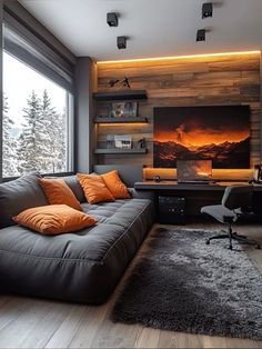 a living room filled with furniture and a flat screen tv mounted to the side of a wall