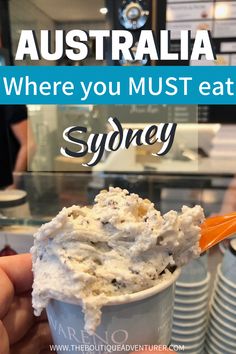 there is a cup with some food in it and the words australia where you must eat sydney