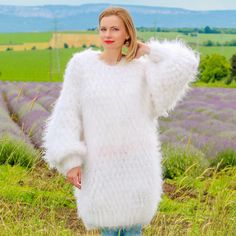 "FLUFFY CLOUD BY SUPERTANYA READY TO SHIP One size, fit XL, XXL Body length, measured from the shoulder top to the bottom end (handing position): 31.5\" / 80 cm Chest width, measured at the back, between the underarms: 24.8\" / 63 cm; Sleeve length, measured from the neckline to the end of the cuff: 30.7'' / 78 cm *All measurements are taken with the item laid flat and not stretched. Code: 0.930 The top quality materials, craftsmanship and service, in addition to the best price/value ratio of my White Crew Neck Sweater Dress For Winter, Cozy White Sweater Dress For Winter, White Long Soft Knit Sweater, Long White Soft Knit Sweater, White Mohair Sweater With Crew Neck, White Mohair Crew Neck Sweater, Cozy White Mohair Sweater, Mohair Dress, Fuzzy Mohair Sweater