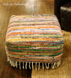 an image of a small ottoman with fringes on the bottom, and text that reads inspired design challenge week 2 urban outfitters