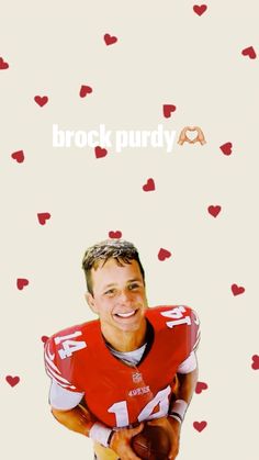 a man in a football uniform with hearts on the wall behind him and words that read, brock purdy