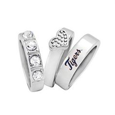 two wedding rings with hearts and the word bride written on them in white gold or silver