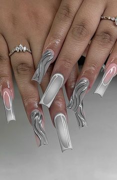 long silver chrome acrylic nails Silver Chrome Acrylic Nails, Classy Nails Acrylic, Chrome Acrylic Nails, Nails Metallic, Almond Acrylic Nails Designs, Cowboy Nails, Gel Nails Long, White And Silver Nails, Chrome Nails Designs