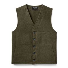 Our classic Mackinaw Wool Vest is warm, durable and versatile. 100% virgin wool is naturally water-repellent and insulates even when wet, ideal for use in rain and snow. A roomy fit allows easy layering, and wide armholes provide a full range of motion. Filson Vest, Filson Mackinaw, Navy Blue Vest, Tweed Waistcoat, Herringbone Tweed, Vest Designs, Blue Vests, Retro Mode, England Fashion