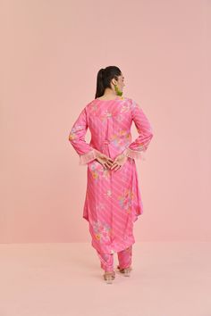 Printed kurta with colorful sequins and bead embroidery on the collar and delicate tassel fringe on sleeves paired with straight pantsFrom Chamee and Palak's Fleur collection.DELIVERY TIMEPlease allow 6-8 weeks for your outfit to arrive.FABRIC DETAILSSatinProfessional cleaning only.DISCLAIMERThe product is made to order. There might be mild variations in print and color Elegant Eid Sets With Tassels, Traditional Festive Pant Set With Set-in Sleeves, Eid Pant Set With Long Set-in Sleeves, Designer Long Sleeve Pant Set With Printed Motifs, Festive Palazzo Set With Set-in Sleeves For Eid, Festive Long Sleeve Pant Set With Printed Motifs, Designer Palazzo Set With Tassels For Eid, Designer Wear Sets With Set-in Sleeves For Eid, Designer Tassel Palazzo Set For Eid