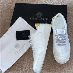 White Versace Sneakers Versace Logo Laces Brand New Never Worn Comes In Box Size It40 > Versace Sizing Guide Says That’s Size 7 But They’re Too Big For Me (I’m A 7-7.5) They Probably Fit More Like A Men’s 7/Women’s 8.5. Luxury Yellow Sneakers With Round Toe, Luxury Yellow Low-top Sneakers, Luxury Low-top Yellow Custom Sneakers, Luxury Yellow Low-top Custom Sneakers, Versace Chain, Versace Sneakers, Versace Logo, Versus Versace, Versace Shoes