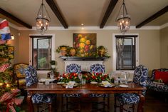 the dining room is decorated for christmas with festive decorations