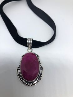 Brilliant dark Red ruby Lovely handmade silver work Low content silver NOT 925 Sterling Silver About 2 inch long All jewelry is shipped in a nice gift box. Check out our over a THOUSAND great reviews Handmade Ruby Jewelry For Gift, Silver Ruby Jewelry For Gift, Oval Ruby Jewelry Engraved, Oval Ruby Jewelry With Engraving, Silver Ruby Cabochon Jewelry, Oc Aesthetic, Raw Ruby, Silver Locket Necklace, Silver Locket