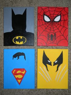 four different batman and spiderman paintings on the floor