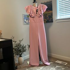 Nwt Shein Pull-Up Jumpsuit Is A Soft Shade Of Lavender. V Neck Front Is Edged With Playful Lace And There Are Double Ruffles At Shoulders. Wide Legs, And A Zip Closure At Back. Bust Is 18”, Waist Is 14”, And Length Is 58”. Brown Lounge Pants, Red Wide Leg Pants, Floral Palazzo Pants, Silk Wide Leg Pants, Red Trousers, Crop Top Set, Shein Pants, Halter Jumpsuit, Backless Jumpsuit