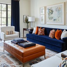 Blue Couch Orange Pillows, Navy Blue White And Orange Living Room, Navy And Orange Decor, Rust Color Living Room Decor, Blue Terracotta Living Room, Navy And Burnt Orange Living Room, Navy And Burnt Orange Bedroom, Blue And Rust Living Room Decor, Navy Orange Living Room