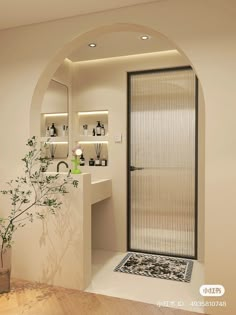 a bathroom with a sink, mirror and shower stall in it's center area