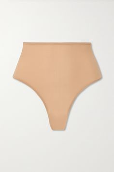 SKIMS' 'Sienna' thong is made to be sculpting and supportive just like the other pieces in the line, while the seamless finish gives it a barely-there feel. The high-rise waist is so flattering, too. Nylon High Cut Shapewear, Seamless Stretch String Swimwear, High Stretch Beige Intimate Briefs, High Stretch Beige Briefs, High Cut Micro-elastic Smoothing Swimwear, Stretch High Cut Bottoms With Seamless Construction, High Cut High Stretch Seamless Bottoms, High Cut Stretch Bottoms With Seamless Construction, High Cut Seamless High Stretch Bottoms