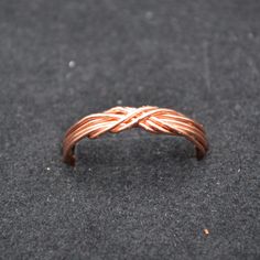 Handmade Solid Copper Infinity Celtic Knot Ring. I use one continuous piece of 20 gauge pure copper wire to create each ring. I make them to order so please include the ring size needed. I love all things celtic and copper is my favorite medium. Celtic knots are the ties that bind. Wear and share them, binding life, love, family and friends together. Wire Wrapped Jewelry Rings, Infinity Knot, Celtic Knot Ring, Ties That Bind, Copper Style, Celtic Knots, Wooden Ring, Knot Ring, Accessories Ideas