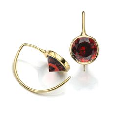 Comet Garnet Earring - #sorrelsky #sorrelskygallery #fineart #instaart #artgallery #southwestart #westernart #santafeart #durangoart #durangoco #durangocolorado #santafenm #art #artcollector #artcollectors #artoftheday #santafeartgallery #onlineartgallery #gold #goldearrings #garnet #tobeypomeroy #goldhoops #hoopearrings Modern Faceted Jewelry For Evening, Modern Formal Briolette Earrings, Modern Briolette Earrings For Formal Occasions, Evening Round Gemstone Earrings, Modern Red Round Earrings, Modern Round Earrings For Evening, Elegant Round Faceted Hoop Earrings, Elegant Faceted Hoop Earrings As Gift, Cody Sanderson