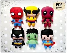 the avengers plushies are lined up in different colors and sizes, including black, yellow, red, green, blue