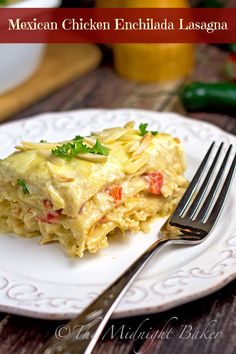 mexican chicken enchilada lasagna on a white plate with a fork