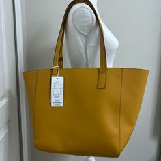 Xl Mustard Yellow Insude Accesories Pouch Color Goes With Everything Large Elegant Beige Shoulder Bag, Large Beige Shoulder Bag With Removable Pouch, Chic Large Beige Shoulder Bag, Elegant Large Shoulder Bag For Shopping, Chic Large Satchel For Shopping, Elegant Yellow Satchel With Large Capacity, Elegant Large Capacity Yellow Satchel, Elegant Large Bag For Errands, Elegant Large Capacity Yellow Bag