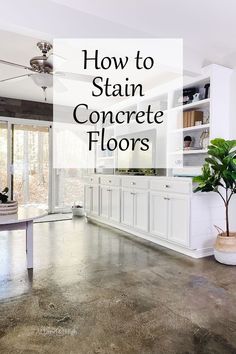 a white kitchen with the words how to stain concrete floors