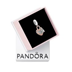 PRICES MAY VARY. Sparkling Heart Charm: This meaningful PANDORA charm features the silhouette of a heart in 14k rose gold plating that outlines a sterling silver heart Pavé-set with brilliant-cut cubic zirconia Compatible with PANDORA Moments: PANDORA Moments is a way to say something about who you are through every charm and bracelet you choose and how you choose to wear it Features CZ: Cubic zirconia could be said to be the jewel in PANDORA's crown, making up the majority of stones we use in o 18th Pandora Charm, Crown Making, Pandora Collection, Pandora Rose, Pandora Heart, Queen Jewelry, Heart Padlocks, Pandora Bracelet Charms, Pandora Charm