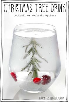 a christmas tree drink in a glass filled with water