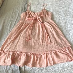 Never Worn And Totally Adorable. Can Be Worn With Heels Or Flats And Even With A Jean Jacket Over Top. Tie Can Be In Front Or In Back. Casual Loungewear Dress With Adjustable Straps, Spring Tie Back Casual Dress, Spring Casual Tie-back Dress, Casual Pink Sundress With Ruffled Straps, Pink Casual Mini Dress With Ruffled Straps, Casual Mini Dress With Ruffled Straps For Daywear, Loungewear Dresses With Spaghetti Straps And Ruffles, Spaghetti Strap Sundress With Ruffles For Daywear, Spaghetti Straps Ruffled Dresses For Loungewear