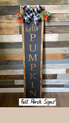 a wooden sign that says hello pumpkin and has a bow on the front saying fall porch signs