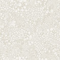 a white and gray floral wallpaper with lots of small flowers on the top of it