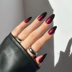 If vampires are more your thing, work black and burgundy into your Halloween nail look. This almost metallic ombré fade looks sinister and chic, making it a must in our seasonal mani book. Witchy Dip Nails, Fall Nails For Pale Skin, Winter Dark Nails, Cauldron Nails, Dark Colour Nails, Vampire Nails Acrylic, Black Gel X Nails, Dark Nails Inspiration, Vampire Nails Designs