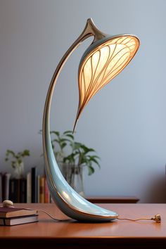 a lamp that is sitting on top of a table next to a bookshelf