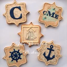 cookies decorated with marine themed icing and handwritten words