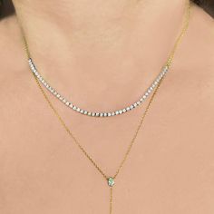 The Lucy Half Diamond Tennis Necklace is the perfect solution when less is more The 4" strand of 50 prong set, brilliant white round diamonds totaling .98 CTS diamonds adorns the adjustable cable link chain This pretty piece is available in two lengths (14/15/16" or 16/17/18") and features a solid gold lobster claw clasp Available in Yellow gold White Gold Diamond Tennis Necklace With Adjustable Chain, Classic Diamond Tennis Necklace With Adjustable Chain, Dazzling Diamond White Necklace With Adjustable Chain, Classic Round Tennis Necklace With Adjustable Chain, Fine Jewelry Tennis Necklace With Adjustable Chain As Gift, White Diamond Necklace With Adjustable Chain, Classic Diamond White Necklace With Adjustable Chain, Diamond Tennis Necklace With Adjustable Chain For Formal Occasions, Timeless Round Diamond Necklace With Adjustable Chain