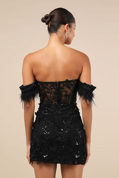 A night of magic starts with the Lulus Midnight Sparkle Black Embroidered Feather Bustier Mini Dress! Stunning embroidery, accented by sparkling black sequins, adorns a mesh overlay that shapes feather-trimmed, off-the-shoulder sleeves that frame the bustier-style bodice with padded cups and sheer mesh panels (with supportive boning). High, fitted waist sits atop a figure-flaunting bodycon skirt that ends at a sexy mini hem. Hidden no-slip strips at back of bodice and hidden zipper/clasp at back. Fit: This garment fits true to size. Length: Above mid-thigh. Bust: Great for any cup size. Waist: Fitted - very fitted at natural waist. Hip: Fitted - stretchy fabric allows room for hips. Undergarments: Padded cups - May be worn with petals, or no bra. Fabric: Fabric has some stretch. Cups and s Black Dress Classy Short Night, Black Sequin Dress Outfit, Black Lace Dress Short, Short Sparkly Dresses, Sheer Bustier, Sequin Dress Outfit, Midnight Sparkle, Black Feather Dress, New Years Eve Dress