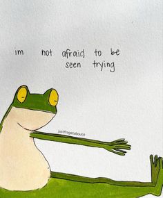 a frog sitting on top of a green grass covered ground next to a quote that reads, i'm not afraid to be seen trying