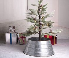 a small christmas tree in a tin can