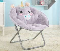 a child's rocking chair with a unicorn on it