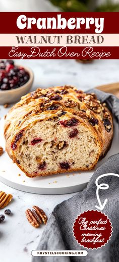 a loaf of cranberry walnut bread on a plate with pecans around it