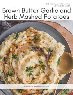 brown butter garlic and herb mashed potatoes in a bowl with a spoon on the side