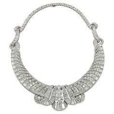 A stunning necklace from the Art Deco period, comprising of circular and baguette-cut diamonds, weighing a total of 52 carats. The diamonds are E-F-G color, VS clarity. Metal is platinum. Gross weight is 67.25 gr 13 3/4 ins long (35 cm). Circa 1930s. Antique Art Deco Necklace Diamonds, Luxury Art Deco Necklace With Rose Cut Diamonds, Art Deco Jewelry Necklace, Ruby And Diamond Necklace, Tiaras Jewellery, Vintage Choker Necklace, Vintage Choker, Jewelry Accessories Ideas, Art Deco Necklace