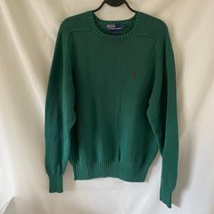 Men's size medium  The perfect vintage pullover.  Amazing green color, vintage condition (still in great condition for a vintage piece), long sleeve, 100% cotton material, crew neck style. Green Long Sleeve Polo Sweater With Ribbed Cuffs, Casual Green Polo Sweater For Fall, Green Long Sleeve Casual Polo Sweater, Green Long Sleeve Cotton Sweater, Casual Green Polo Sweater With Ribbed Cuffs, Green Cotton Polo Sweater For Winter, Green Long Sleeve Polo Sweater For Winter, Green Long Sleeve Sweater With Ribbed Cuffs, Green Long Sleeve Polo Sweater