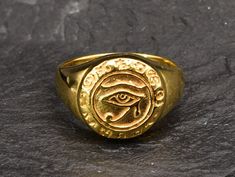 Egyptian Eye Ring made of Gold Vermeil: 18k Gold over Solid 925 Sterling Silver ☞ made to last.Matching Pendant & Matching Earrings ☞ please ask me Details:• Ancient Gold Ring• Dimensions: Band width 3.6mm, thickness 1.3mm• 18k Gold Vermeil SKU 1332513759 Gold Spiritual Signet Ring For Anniversary, Spiritual Yellow Gold Signet Ring Gift, Yellow Gold Spiritual Signet Ring, Gold Spiritual Rings With Polished Finish, Spiritual Yellow Gold Tarnish-resistant Signet Ring, Spiritual Hallmarked Yellow Gold Rings, Spiritual Yellow Gold Rings, Spiritual Gold-plated Yellow Gold Rings, Spiritual Style Yellow Gold-plated Rings