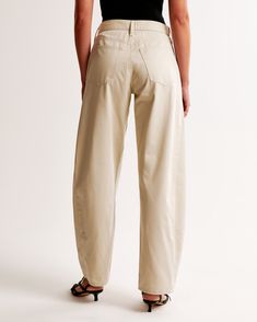 Mid rise pants in our twill fabric, that have a relaxed fit at the waist and hips, loose fit through the thigh and calf, and tapers into a barrel-leg shape. Features functional pockets, belt loops and waistband closure. Belted Beige Cotton Bottoms, Versatile Beige Short-length Bottoms, Cream Mid-rise Cotton Bottoms, Beige Bottoms With Pockets, Short Length, Abercrombie Utility Pants, Suits Coats, Athletic Fits, New Arrival Dress, Swimwear Accessories