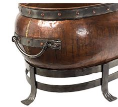 an old wooden barrel with metal handles