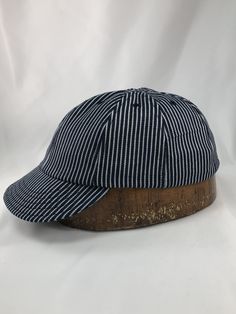 Now, our classic 8 panel shallow cut cap is available in Herringbone denim or Hickory stripe denim. This classic style and fit our sure make this your favorite hat. The more you wear our caps the more comfortable they are. Experience what it's like to own a custom made Cap from Stockbridge sewing works! Adjustable Striped Baseball Cap, Striped Cotton Cap, Classic Striped Adjustable Hat, Classic Adjustable Striped Hat, Striped Cotton Hat With Curved Brim, Find My Passion, Two Heads, Custom Caps, Cool Hats