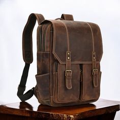 Discover the ultimate blend of style, durability, and functionality with our 17" Personalized Leather Backpack! 🌟 Whether you're heading to work, school, or an adventurous travel destination, this backpack is designed to meet all your needs. 🚀 Crafted from premium full-grain leather, this rucksack not only looks stunning but also promises unmatched longevity. 💼 Say goodbye to flimsy bags and hello to a sturdy companion that ages beautifully and withstands the test of time. 🕰️ Imagine carryin Classic Satchel Backpack For Outdoor, Classic Outdoor Satchel Backpack, Classic Large Capacity Backpack For Everyday, Classic Outdoor Leather Backpack, Classic Leather Backpack For Outdoor, Classic Large Capacity Laptop Backpack, Rugged Laptop Bag For Travel, Rugged Rectangular Backpack For Daily Use, Leather Laptop Backpack For Outdoor