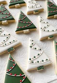 christmas cookies decorated with green and white icing