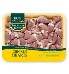 chicken hearts are in a yellow container on a white background with the words, 100 % natural sanremison farms