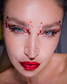 Red Diamond Eye Makeup, Red Rhinestone Makeup Looks, Glitter Blood Makeup, Red Jewel Makeup, Red Rhinestone Eye Makeup, Red Gems Makeup, Red Outfit Makeup, Red Gem Makeup, Red Birthday Makeup