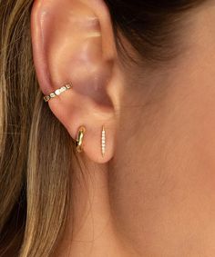 Just enough edge, this stud adds so much style & truly elevates your ears. Safe for sensitive skin, our pieces are hand crafted and made to wear 24/7. Solid 14k gold with 7 natural diamonds (.03 cw). Measures 11mm x 1.5mm. Available as a single stud or in a pair. These earrings come with our signature mini push-on butterfly backings for the most hygienic and comfortable fit. Less metal behind your ears means less build-up and more room for multiple piercings close together. Also available in whi Everyday Yellow Gold Diamond Cartilage Earrings, Minimalist Cubic Zirconia Ear Cuff For Everyday, Minimalist Gold Diamond Ear Cuff, Gold Cartilage Earrings With Diamond Accents For Everyday, Minimalist 14k Gold Cartilage Earrings With Diamond Accents, Yellow Gold Ear Climbers For Everyday, Minimalist Cartilage Earrings With Diamond Accents, Minimalist Gold Diamond Ear Climbers, Everyday Yellow Gold Fine Jewelry Ear Climbers